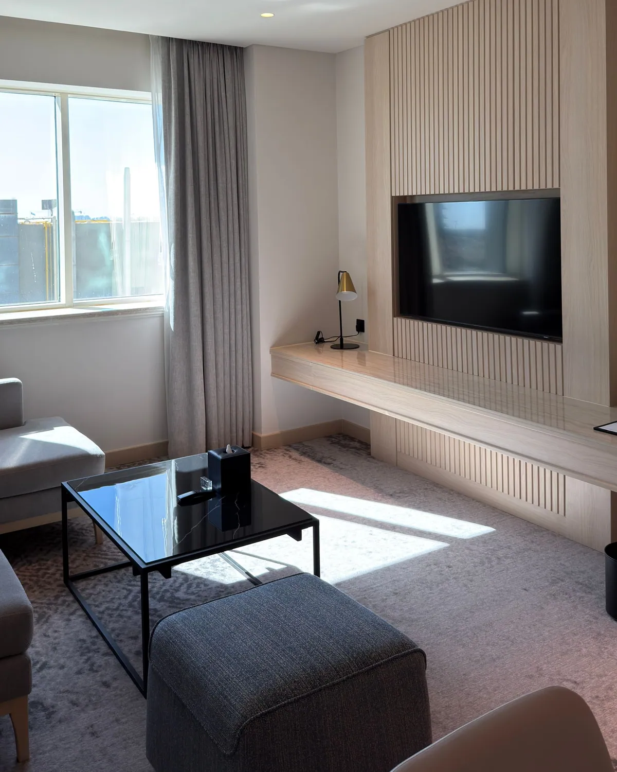 Designer TV wall unit with fluted panels and concealed storage