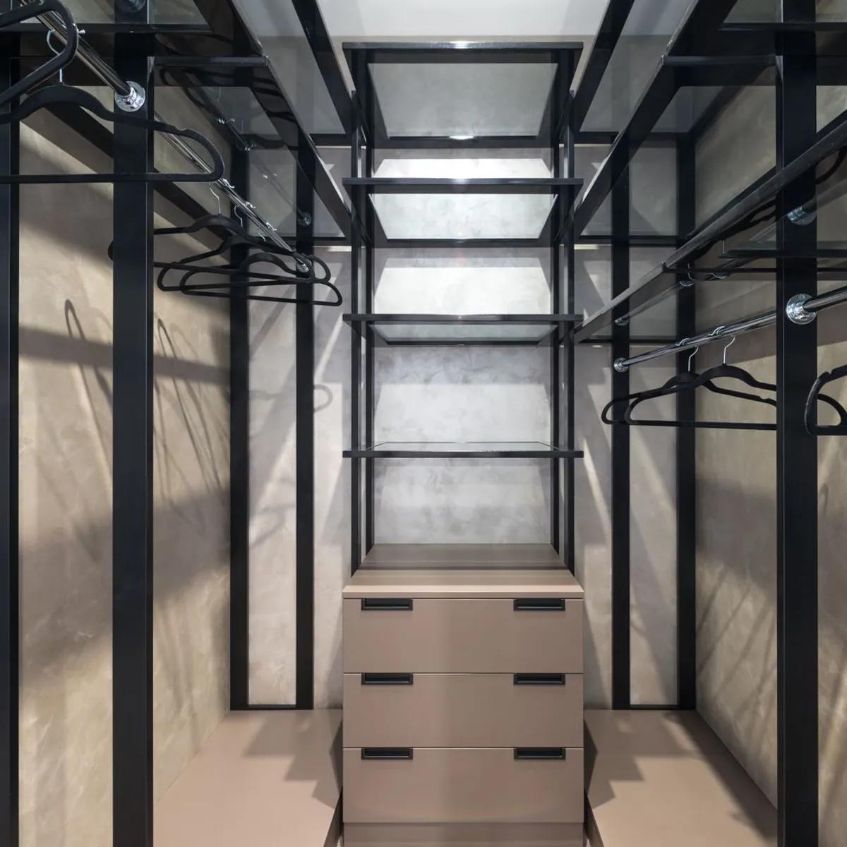 Built-in wardrobe with open shelving and integrated storage